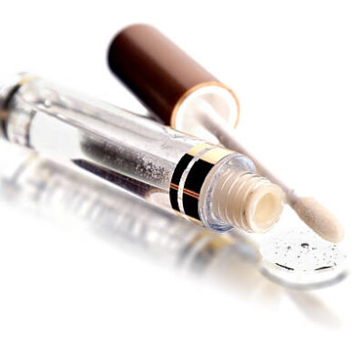 Gloss for lips on the white background