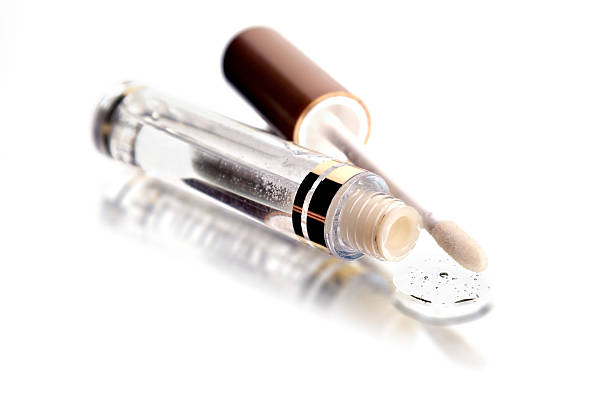 Gloss for lips on the white background