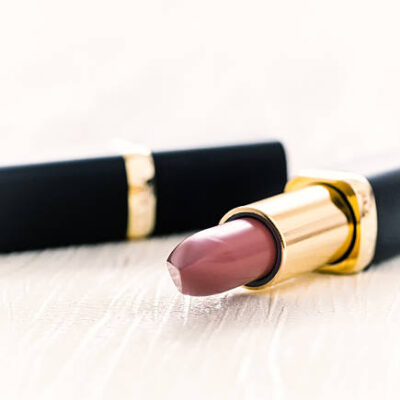 Red lipstick on a white background, face, female, beauty.