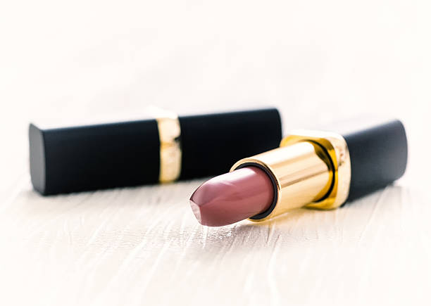 Red lipstick on a white background, face, female, beauty.
